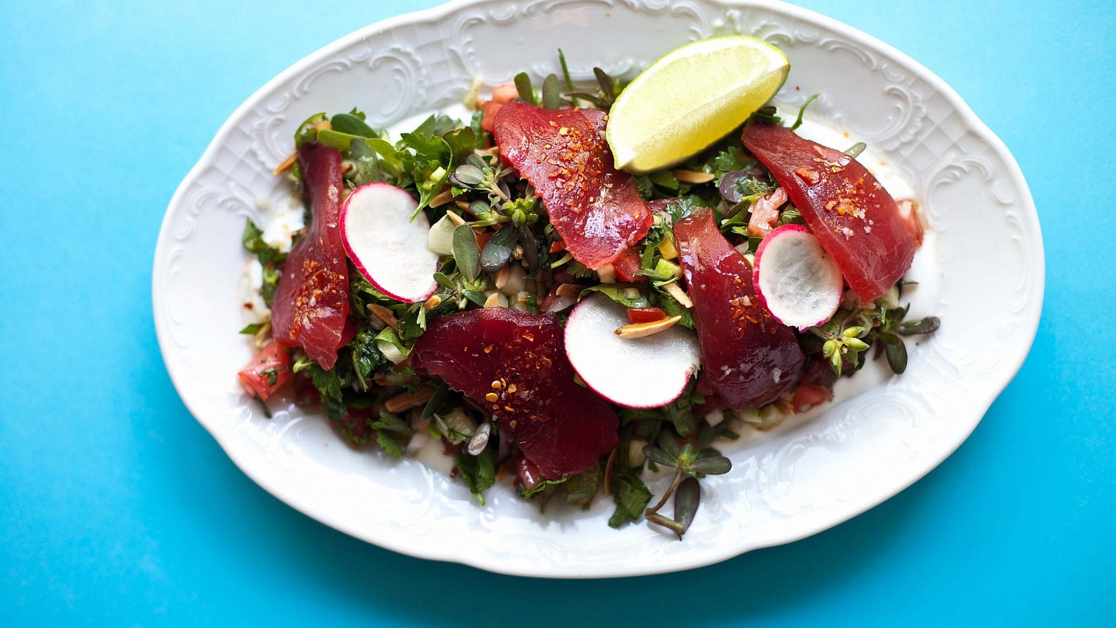 Tuna crudo with herbs and radish