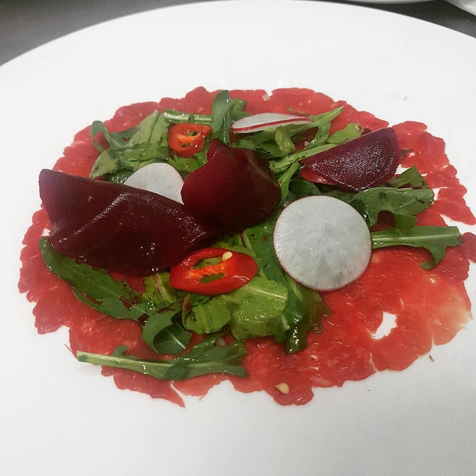 Beef carpaccio with arugula & beet
